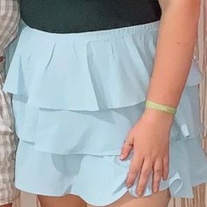 Light blue ruffle skirt size Large, can fit to an XL as well!